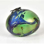 JOHN DITCHFIELD FOR GLASFORM; an iridescent glass paperweight with mounted hallmarked silver lizard,