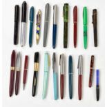 A collection of vintage bakelite pens and propelling pencils, to include Parker Duofold example