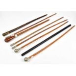 A collection of swagger sticks and officer's canes, various regiments including East Yorkshire,