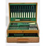 An oak cased canteen of silver plated cutlery.