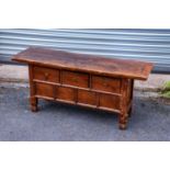 A Chinese elm low side table, with three drawers above a pair of doors, width 130cm, depth 39cm,