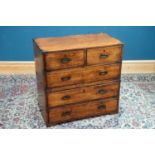 A 19th century brass bound teak campaign chest with two short over three long drawers with counter