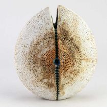 † ALAN WALLWORK (1931-2019); a stoneware split pebble with impressed decoration around the parting