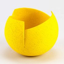 † ASHRAF HANNA (born 1967); a small cut and altered earthenware vessel with textured yellow surface,