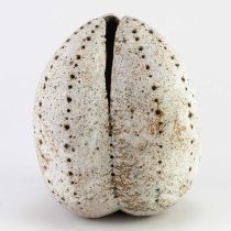 † ALAN WALLWORK (1931-2019); a large stoneware seed pod covered in pale grey glaze with impressed