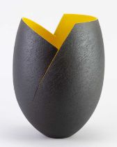 † ASHRAF HANNA (born 1967); a cut and altered earthenware vessel with textured black surface to