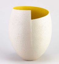 † ASHRAF HANNA (born 1967); a cut and altered earthenware vessel with textured pale grey surface