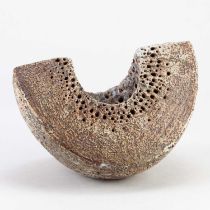 † ALAN WALLWORK (1931-2019); a broad stoneware wedge form partially covered in iron staining with