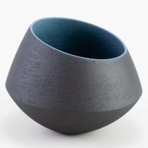 † ASHRAF HANNA (born 1967); an angular earthenware bowl with textured black surface to exterior