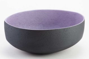 † ASHRAF HANNA (born 1967); an oval earthenware bowl with textured black surface to exterior and