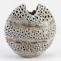 † ALAN WALLWORK (1931-2019); a stoneware pebble with impressed decoration forming horizontal bands