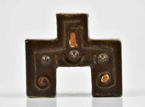 TROIKA POTTERY; a rare London Bridge candle holder with relief decoration in shades of orange and
