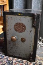 A Victorian cast iron safe with applied plaque for Thomas Perry & Sons Ltd, Bilston, height 56cm,