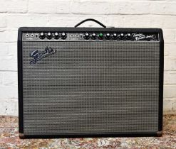 FENDER; a '65 re-issue twin Reverb amplifier, with foot switch and owner's manual.