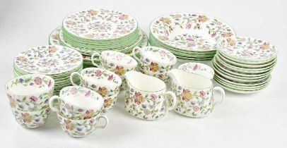 MINTON; a fifty-eight piece part tea and dinner service in the 'Haddon Hall' pattern. Condition