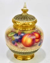 HARRY AYRTON FOR ROYAL WORCESTER; a hand painted potpourri with cover, decorated with fruit, black