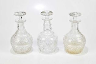 A pair of 19th century cut glass decanters, height 23cm, together with a further cut glass