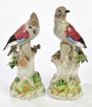 DRESDEN; two large hard paste porcelain models of birds, with floral encrusted decoration, height of