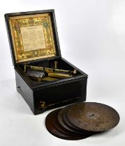 A late 19th century German symphonium in ebonised case, with twelve discs.