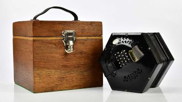 LACHENAL & CO; an ebonised English thirty-five key concertina, no.50920, cased. Provenance: A