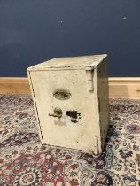 A Victorian cast iron safe, with key.