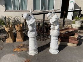 Two Victorian style white painted cast iron water fountains, modelled representing a kneeling girl