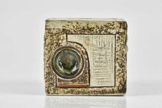 JANE FITZGERALD FOR TROIKA POTTERY; a small cube decorated to each of the four sides with relief and