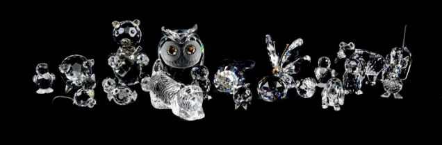 SWAROVSKI; a collection of glass animals, with further unmarked examples and a Waterford Crystal