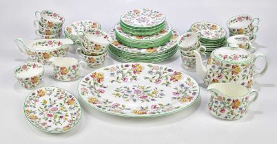 MINTON; a tea and dinner service in the 'Haddon Hall' pattern (seconds quality).
