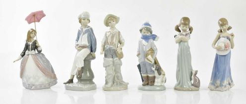 LLADRO; six figures to include young boy sailing a yacht, etc.