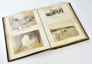 A 19th century photograph album containing photographs mainly of UK landmarks.