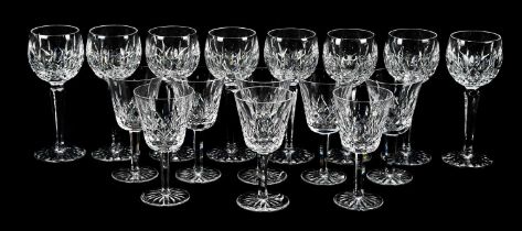 WATERFORD; a set of eight hock glasses and eight wine glasses in the 'Lismore' pattern.