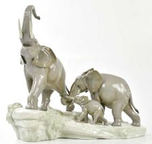 LLADRO; a large and impressive figure group representing family of elephants, length 40cm, height