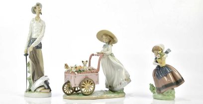 LLADRO; three figures to include, "kitty cart", " spring is here" and "Quixote standing up", all