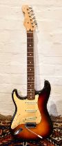 SQUIRE; a made in Japan Stratocaster, SN:K032876, sold with hard case.