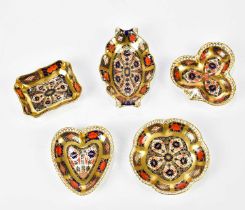ROYAL CROWN DERBY; five pin dishes to include a leaf shaped example, a heart shaped example, etc,