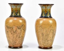 HANNAH BARLOW FOR ROYAL DOULTON; a pair of Artware vases, each sgraffito decorated with horses in