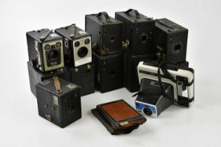 A large collection of cameras including plate cameras, Kodak, box cameras, etc.