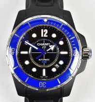 CHANEL; a Marine J12 300m watch with 42mm ceramic case, blue bezel and black face, with a rubber