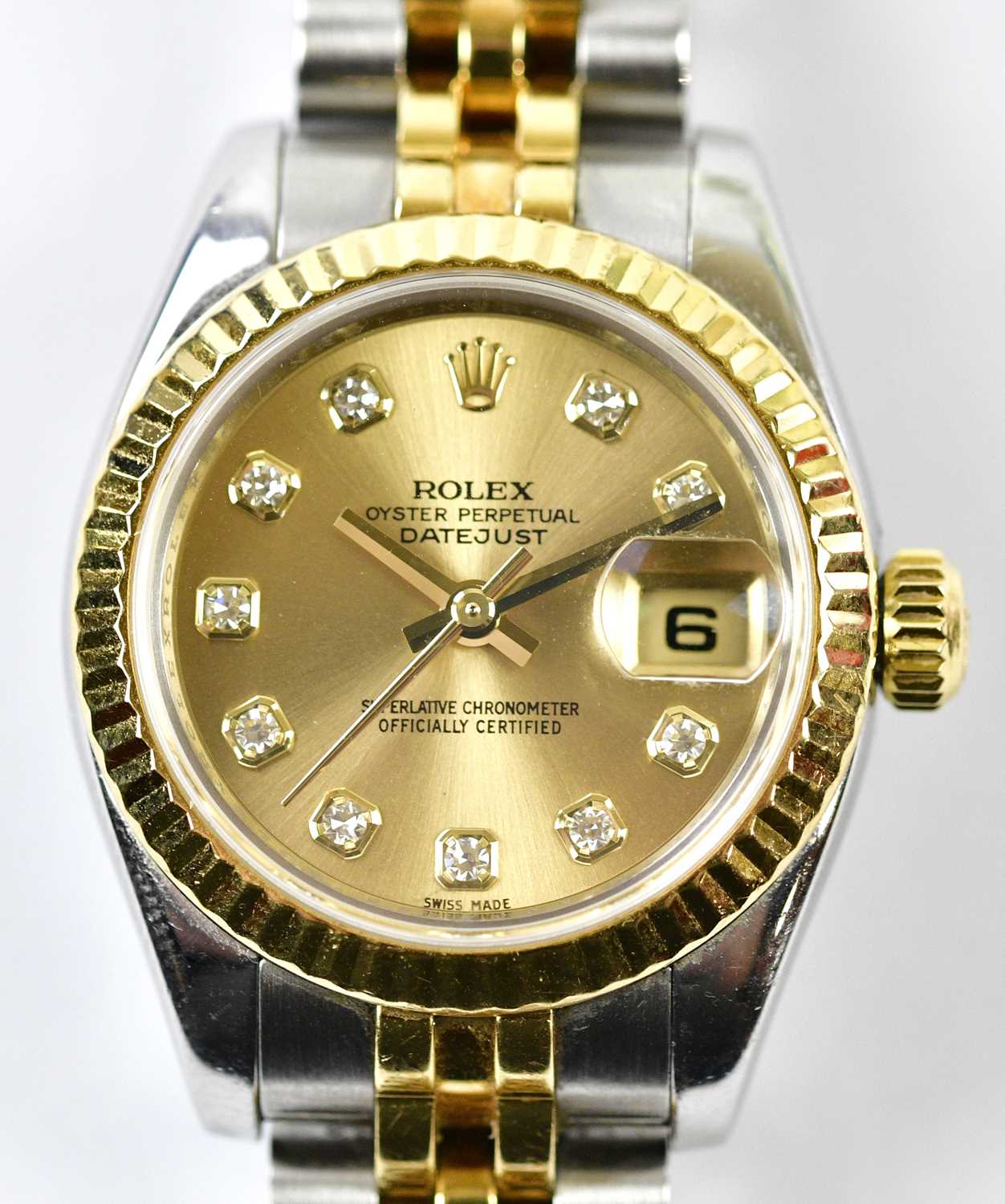 ROLEX; a lady's 18ct yellow gold stainless steel Oyster Perpetual Datejust wristwatch purchased