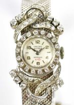 PALLAS; a lady's vintage 18ct white gold and diamond set wristwatch, the circular movement inscribed