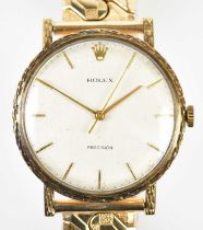 ROLEX; a gentleman's Precision wristwatch, the silvered dial set with batons, diameter excluding