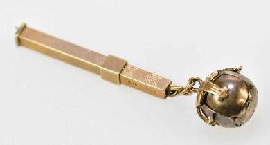 A 9ct yellow gold telescopic toothpick and a Masonic folding orb (2).