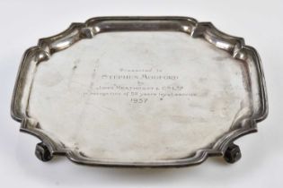 GARRARD & CO LTD; an Elizabeth II hallmarked silver salver of shaped square form raised on four