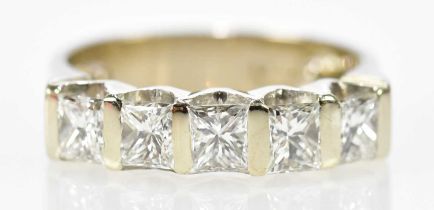 An 18ct white gold five stone princess cut diamond bar set ring with sizing beads, total diamond