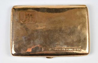 An early 20th century 9ct rose gold cigarette case of rounded rectangular form engraved with