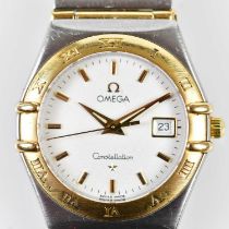 OMEGA; a lady's Constellation two tone wristwatch with baton markers to the circular dial and with