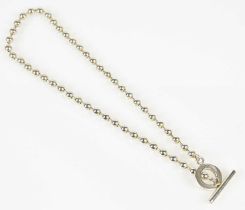 GUCCI; a silver bead necklace with toggle and bar clasp, length 38cm, approx. 25.7g, with pouch