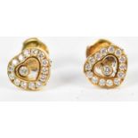 CHOPARD; a pair of 18ct yellow gold and diamond set 'Happy Diamonds' ear studs, each signed and
