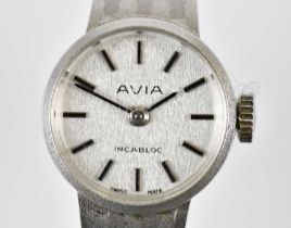 AVIA; a lady's vintage 9ct white gold wristwatch with baton markers to the circular dial and with